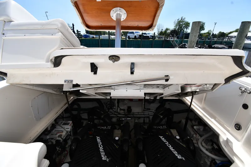 Slide: The Image of Engine compartment of 2007 Sea Ray 340 Sundancer with Mercury engines visible. - 47
