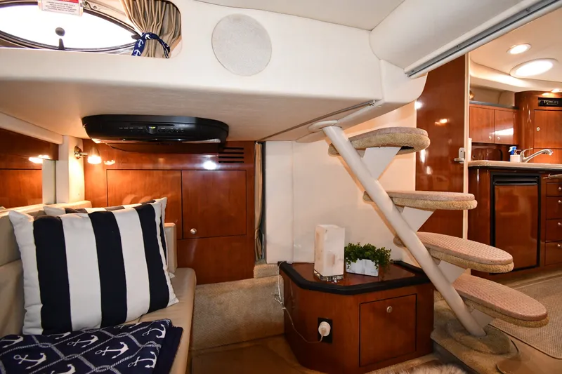 Slide: The Image of Luxurious interior of 2007 Sea Ray 340 Sundancer yacht with elegant wood finishes. - 43