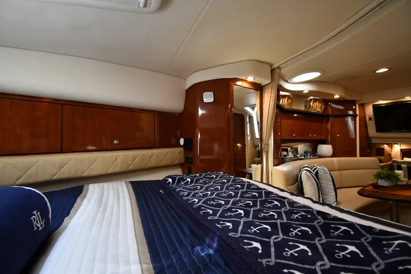 Slide: The Image of Luxurious interior of 2007 Sea Ray 340 Sundancer yacht with elegant wood finishes and cozy seating. - 31