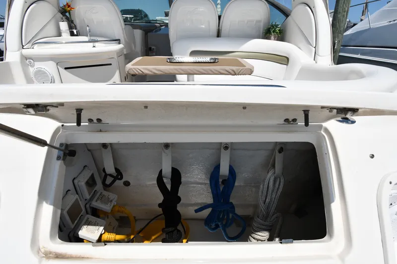 Slide: The Image of Storage compartment on a 2007 Sea Ray 340 Sundancer boat with ropes and cables. - 25
