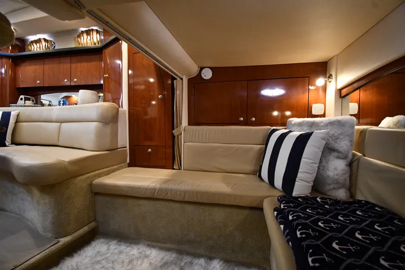 Slide: The Image of Luxurious interior of 2007 Sea Ray 340 Sundancer yacht with plush seating and elegant wood finishes. - 42
