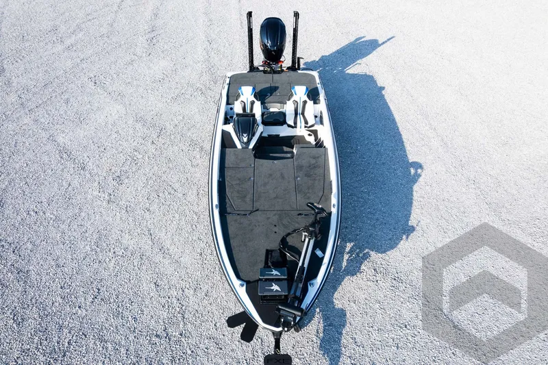 Slide: The Image of 2027 Skeeter FXE21 Limited boat on gravel, aerial view. - 38