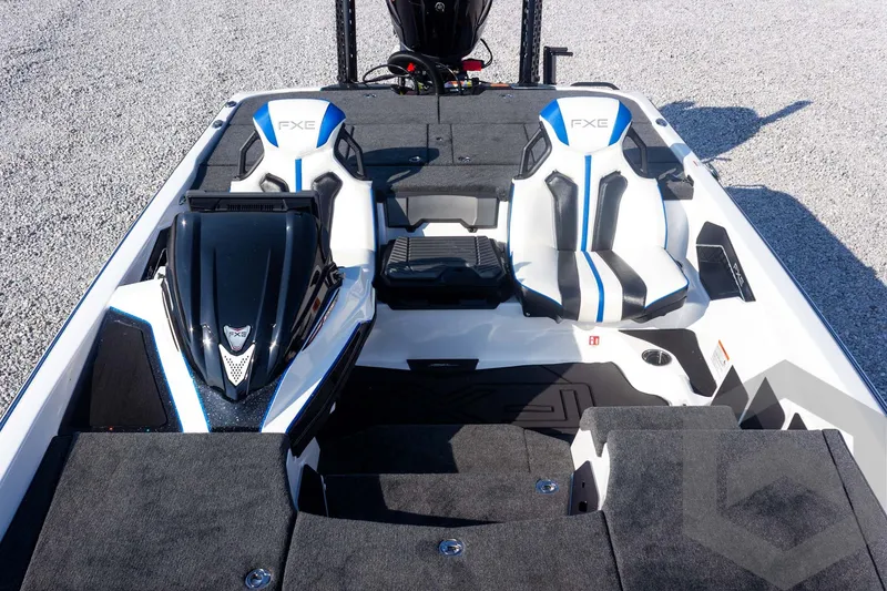 Slide: The Image of 2027 Skeeter FXE21 Limited boat interior with dual seats and sleek design. - 21