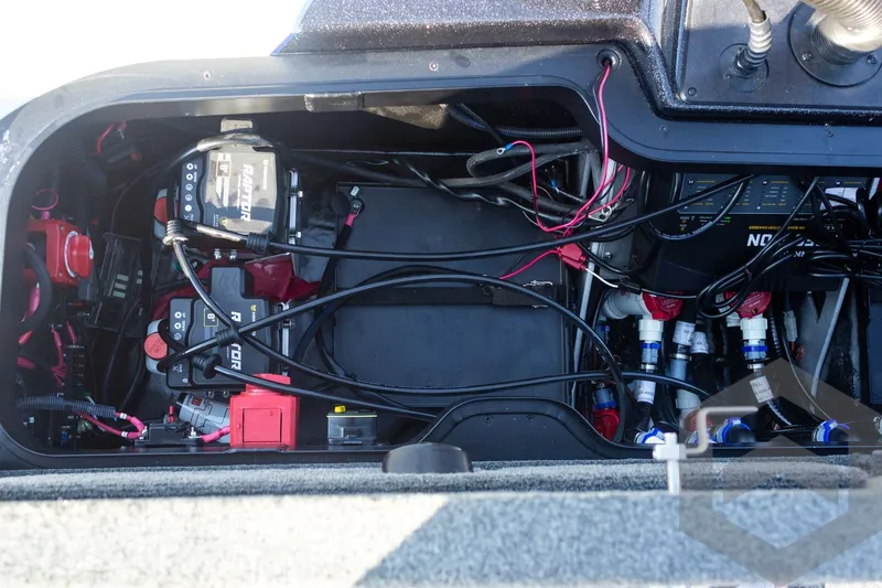 Slide: The Image of Interior view of 2027 Skeeter FXE21 Limited boat's electrical and wiring system. - 30