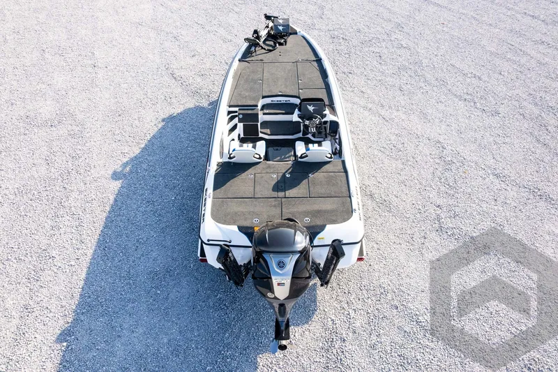 Slide: The Image of 2027 Skeeter FXE21 Limited boat on gravel, top view, showcasing deck layout. - 34