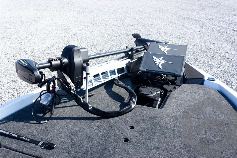 Slide: The Image of 2027 Skeeter FXE21 Limited boat deck with advanced trolling motor and dual screens. - 19