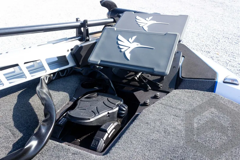 Slide: The Image of 2027 Skeeter FXE21 Limited boat dashboard with advanced navigation controls. - 20