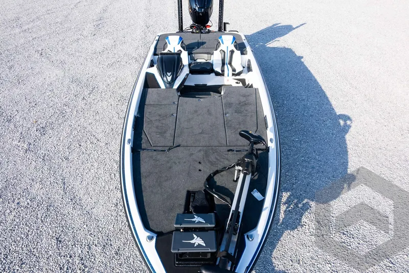 Slide: The Image of 2027 Skeeter FXE21 Limited boat with spacious deck and advanced fishing equipment. - 39
