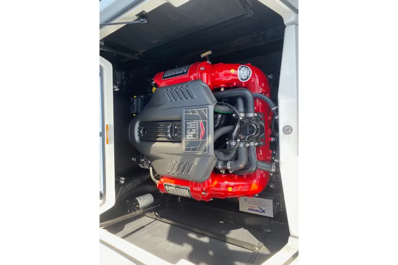 Slide: The Image of 2018 Nautique Super Air Nautique G21 engine with red components and PCM branding. - 34