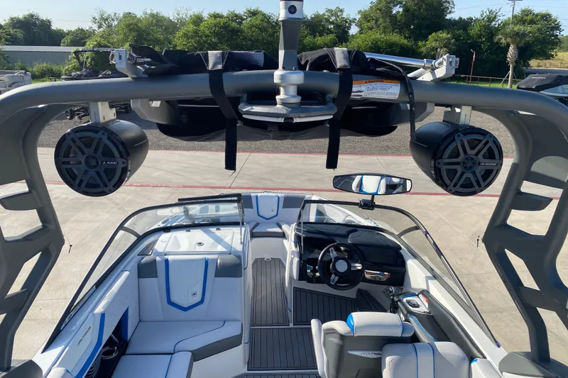 Slide: The Image of 2018 Nautique Super Air Nautique G21 interior with speakers and seating. - 25