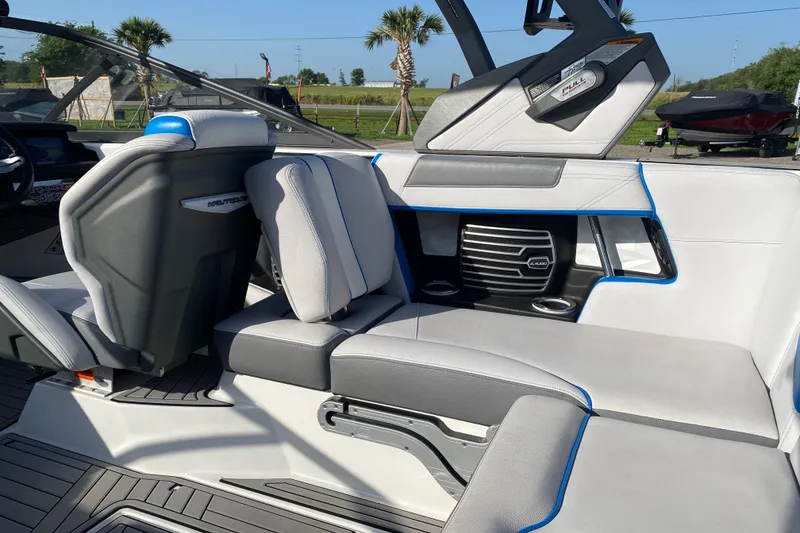 Slide: The Image of Interior of 2018 Nautique Super Air Nautique G21 boat, featuring sleek seating and modern design. - 37