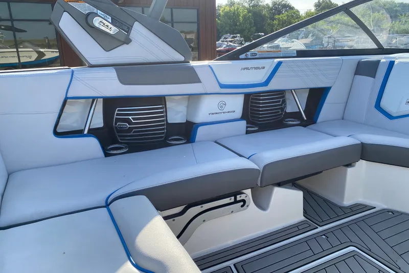 Slide: The Image of 2018 Nautique Super Air Nautique G21 interior with sleek seating and modern design. - 36