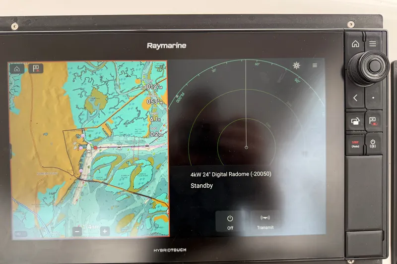 Slide: The Image of Raymarine navigation display showing map and radar interface on Outerbanks Express 2007 boat. - 12