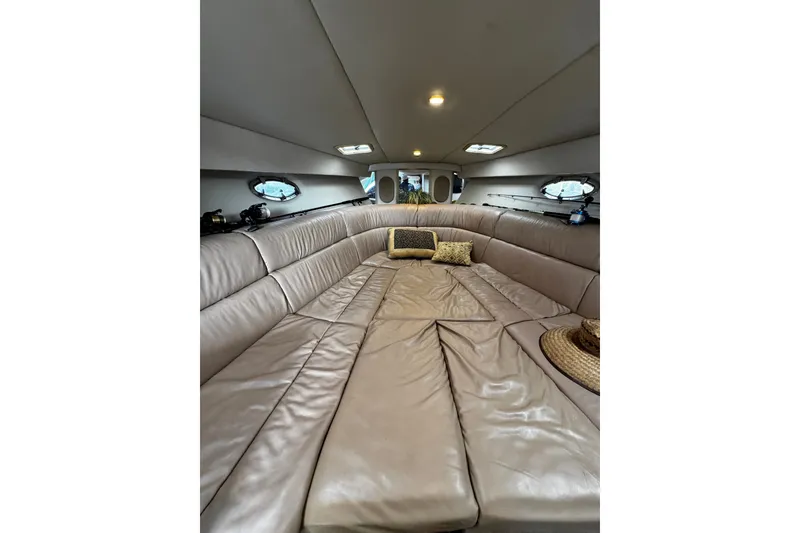 Slide: The Image of Interior of 2004 Formula 370 Super Sport boat with beige leather seating. - 19