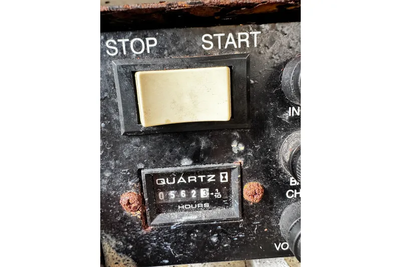 Slide: The Image of Control panel of a 2004 Formula 370 Super Sport boat with hour meter reading. - 34