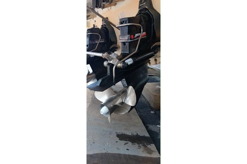 Slide: The Image of Close-up of a 2004 Formula 370 Super Sport boat's Mercury outdrive and propeller. - 37