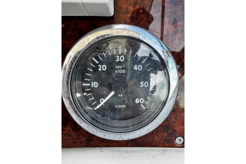 Slide: The Image of Close-up of a 2004 Formula 370 Super Sport tachometer gauge. - 29