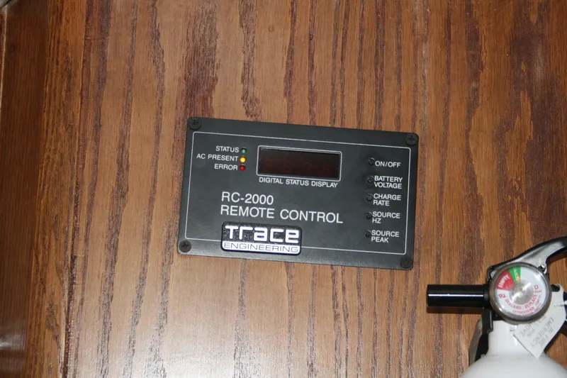 Slide: The Image of RC-2000 remote control panel on 1989 Silverton 34 Convertible boat interior. - 35