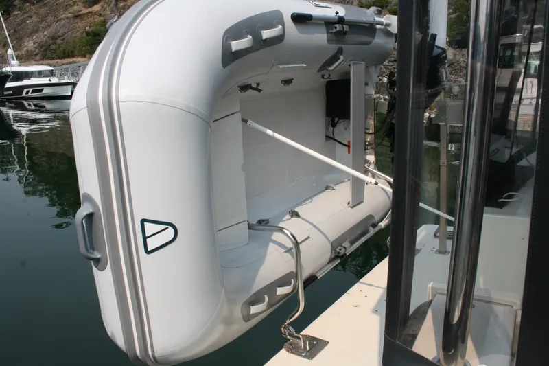 Slide: The Image of Inflatable dinghy mounted on 1989 Silverton 34 Convertible yacht. - 40