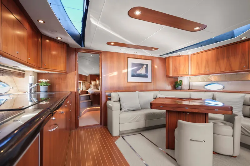 Slide: The Image of Luxurious interior of 2006 Sunseeker Predator 68 yacht with elegant wood finishes. - 19