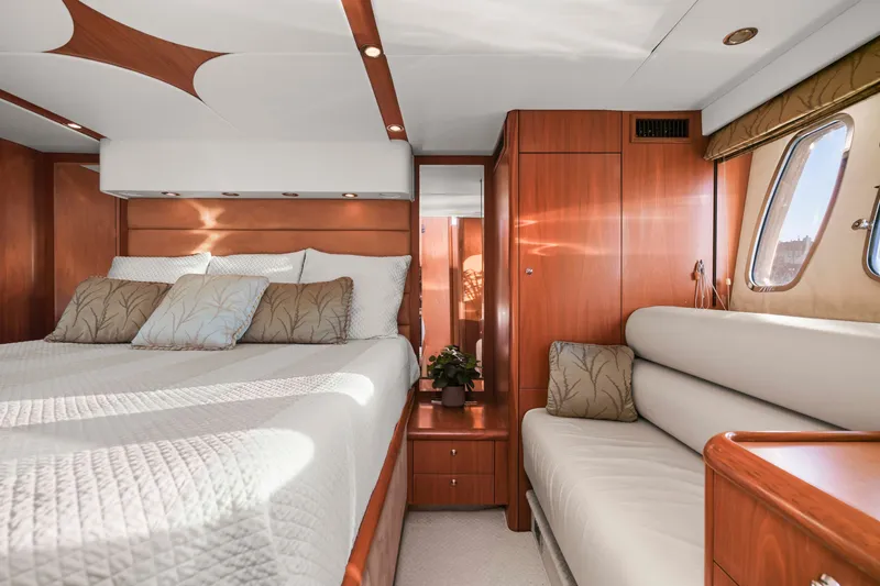 Slide: The Image of Luxurious cabin interior of 2006 Sunseeker Predator 68 yacht with elegant wood finishes. - 35