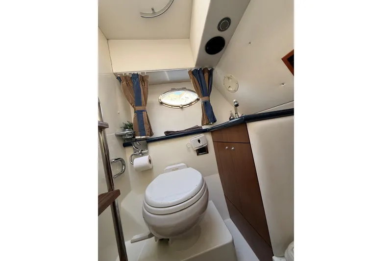 Slide: The Image of Luxurious bathroom in 2006 Sunseeker Predator 68 yacht with modern fixtures. - 39