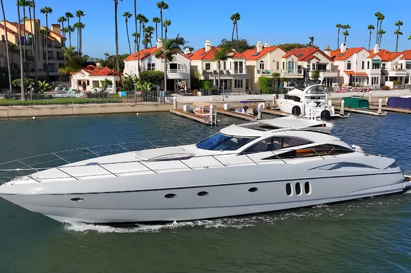 The Image of Luxury Sunseeker Predator 68 yacht cruising in a marina, 2006 model. - 0