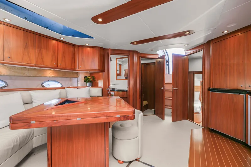Slide: The Image of Luxurious interior of 2006 Sunseeker Predator 68 yacht with elegant wood finishes and modern design. - 29