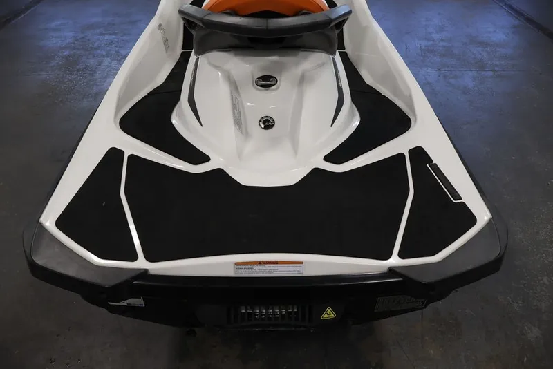 Slide: The Image of 2014 Sea-Doo GTI 130 jet ski, top view, showcasing sleek design and seating area. - 10