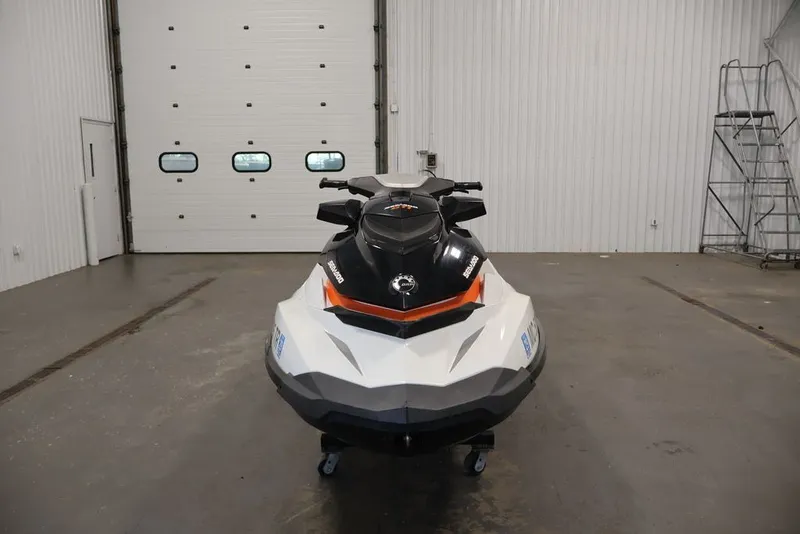 Slide: The Image of 2014 Sea-Doo GTI 130 jet ski in a garage, front view. - 1