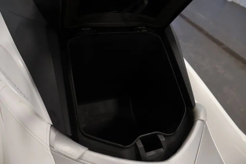 Slide: The Image of Open storage compartment of 2014 Sea-Doo GTI 130 watercraft. - 12