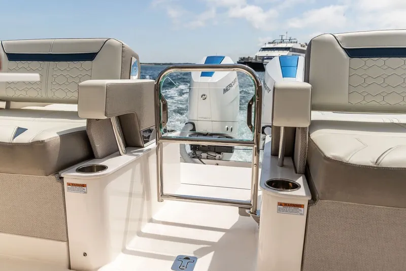 Slide: The Image of 2024 Tiara Yachts 34 LX interior with luxurious seating and ocean view. - 38