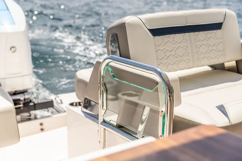 Slide: The Image of 2024 Tiara Yachts 34 LX luxury seating with ocean backdrop. - 39