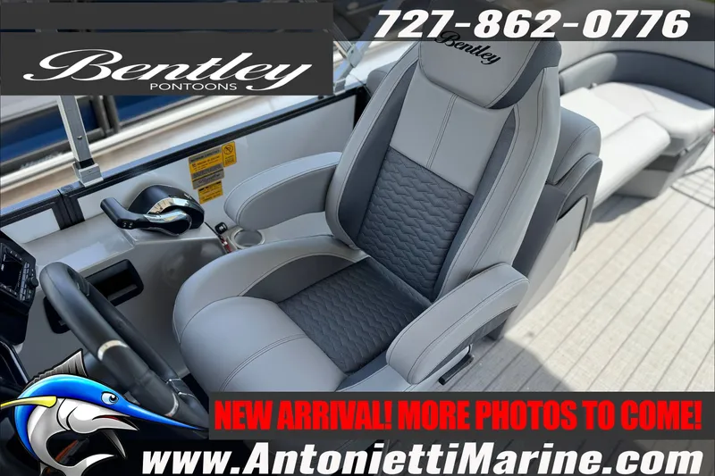 Slide: The Image of 2027 Bentley Pontoons Elite 253 Admiral interior with luxurious seating and controls. - 6