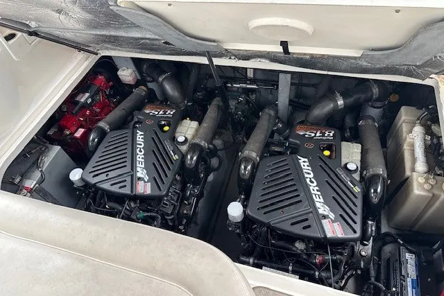 Slide: The Image of Engine compartment of a 2002 Sea Ray 360 Sundancer with twin Mercury engines. - 17