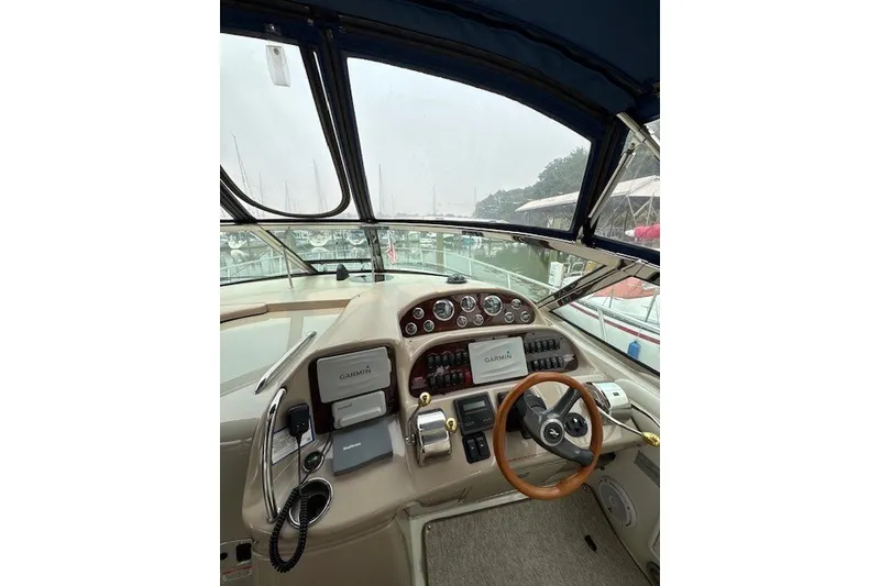 Slide: The Image of Cockpit view of 2002 Sea Ray 360 Sundancer with Garmin navigation system. - 6