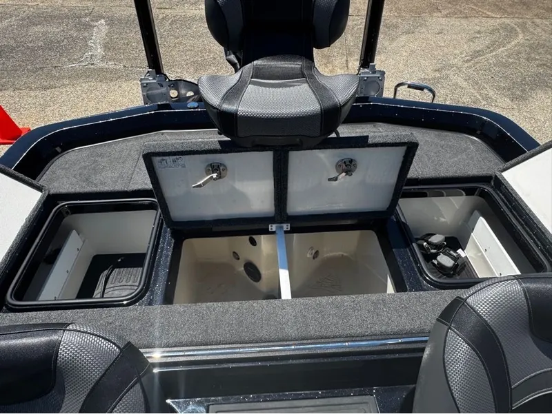 Slide: The Image of The image shows the rear storage area of a 2021 Ranger Z521L boat with open compartments. - 6
