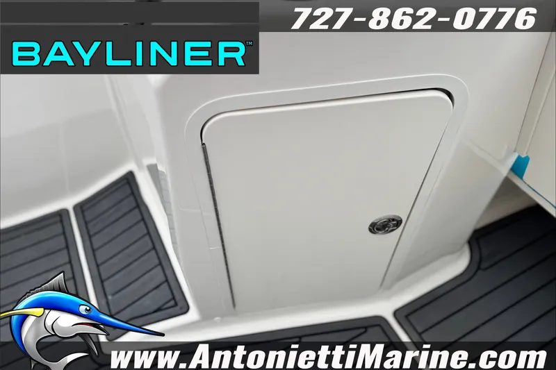 Slide: The Image of 2021 Bayliner Element E21 boat interior with storage compartment, featuring Antonietti Marine branding. - 26