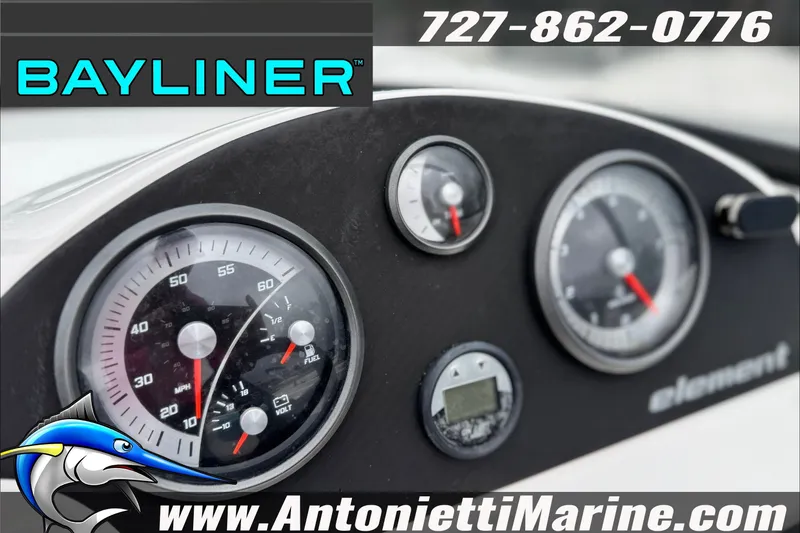 Slide: The Image of Dashboard of 2021 Bayliner Element E21 boat with gauges and branding. - 20