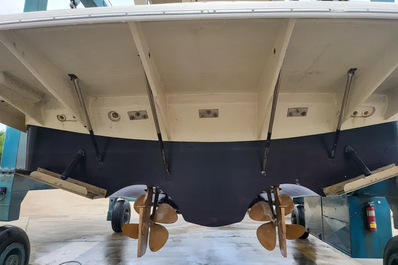 Slide: The Image of Rear view of 2001 Regal Commodore 3780 boat showing propellers and hull details. - 1