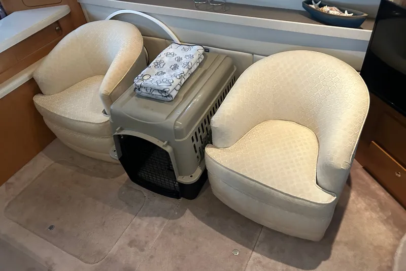 Slide: The Image of Interior of 2001 Regal Commodore 3780 with chairs and pet crate. - 8