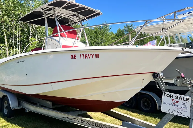 The Image of 2004 Boston Whaler 240 Outrage boat on trailer, for sale by Bayside Boat Sales. - 1