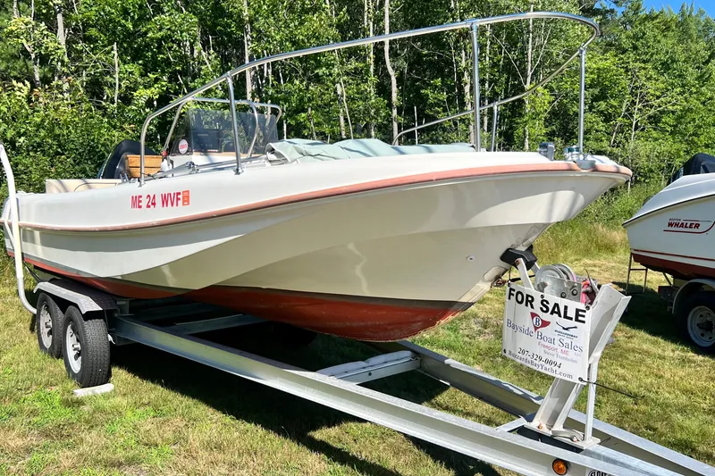 The Image of 1973 Boston Whaler 19 Outrage boat on trailer, for sale by Bayside Boat Sales. - 1