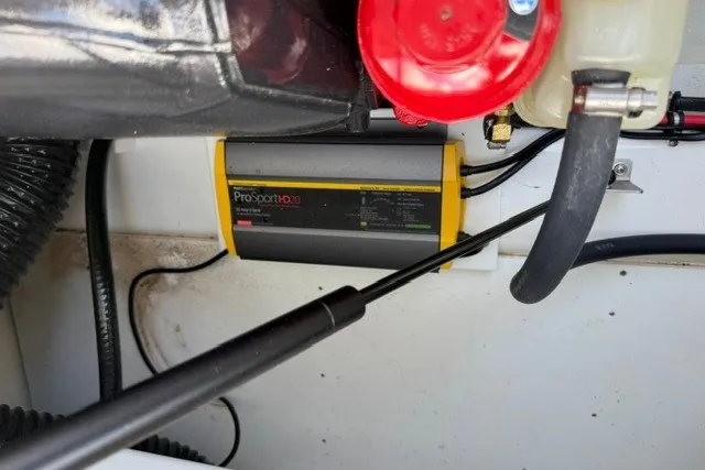 Slide: The Image of Battery charger in 2024 Cobalt R8 engine compartment, featuring ProSport20 model. - 37