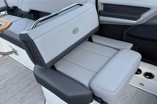 Slide: The Image of 2024 Cobalt R8 boat interior with luxurious gray seating and modern design. - 18