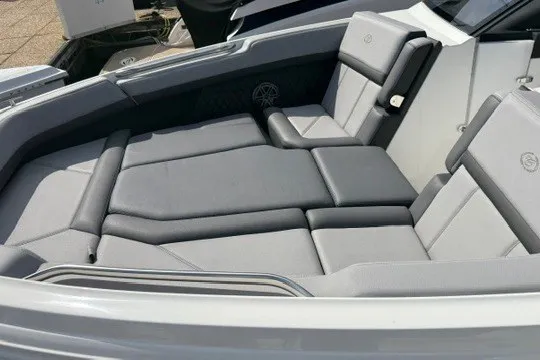 Slide: The Image of 2024 Cobalt R8 boat interior with luxurious gray seating and sleek design. - 25