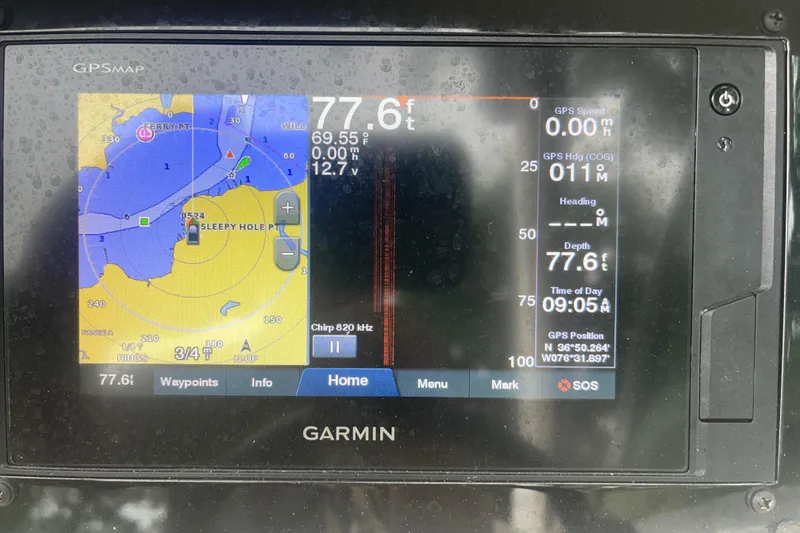 Slide: The Image of Garmin GPS display on 2019 Regal 28 Express, showing nautical map and navigation data. - 27