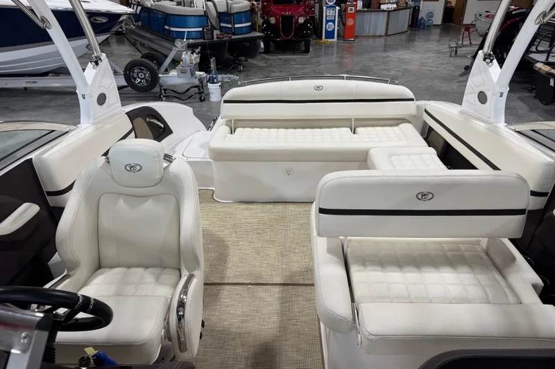 Slide: The Image of Interior of a 2020 Cobalt R5 boat with luxurious white seating and modern design. - 12
