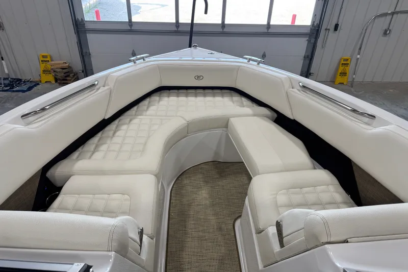 Slide: The Image of Luxurious interior of a 2020 Cobalt R5 boat with plush white seating. - 9