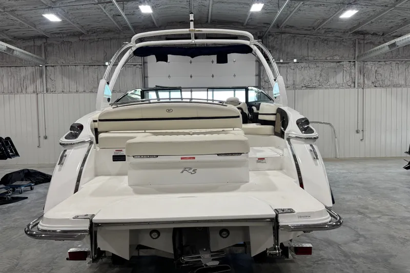 Slide: The Image of 2020 Cobalt R5 boat in a spacious indoor storage facility. - 6